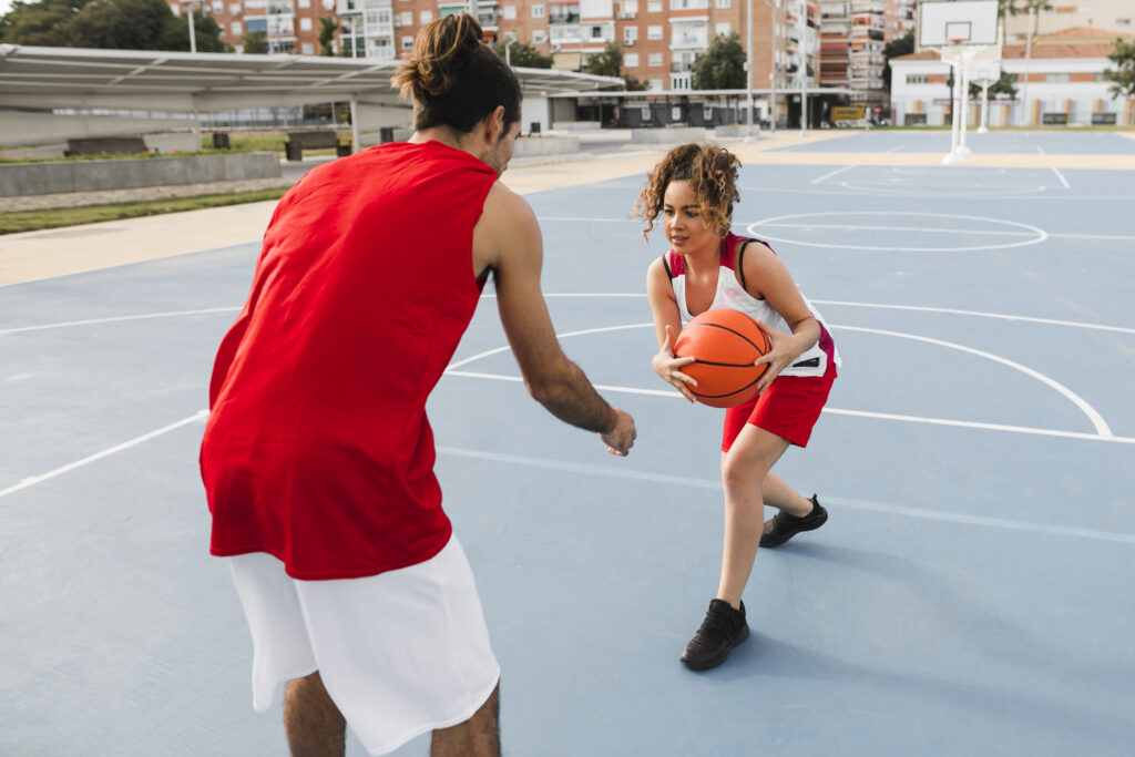 front-view-friends-playing-basketball